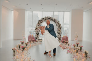 elopement couple celebrating in setting
